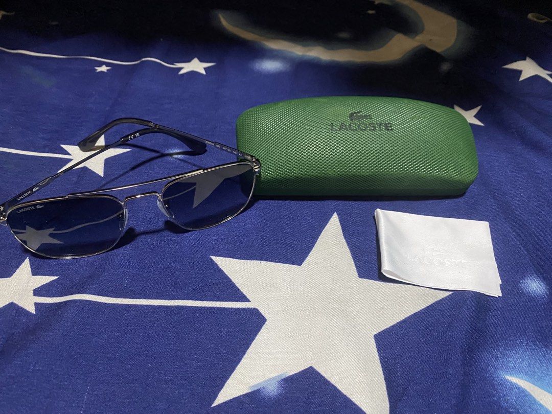 Authentic Aviator Lacoste SunGlass (Category: Sunglasses & Eyewear) located in Bulacan. Submitted by httpsthrift (Listing ID 1468231598, Image 1). Description: Includes Lacoste Case and Lacoste Wipes rfs decluttering .