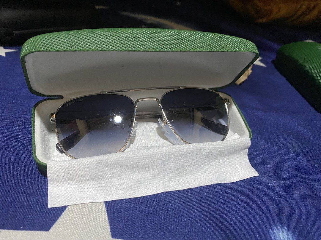 Authentic Aviator Lacoste SunGlass (Category: Sunglasses & Eyewear) located in Bulacan. Submitted by httpsthrift (Listing ID 1468231598, Image 2). Description: Includes Lacoste Case and Lacoste Wipes rfs decluttering .