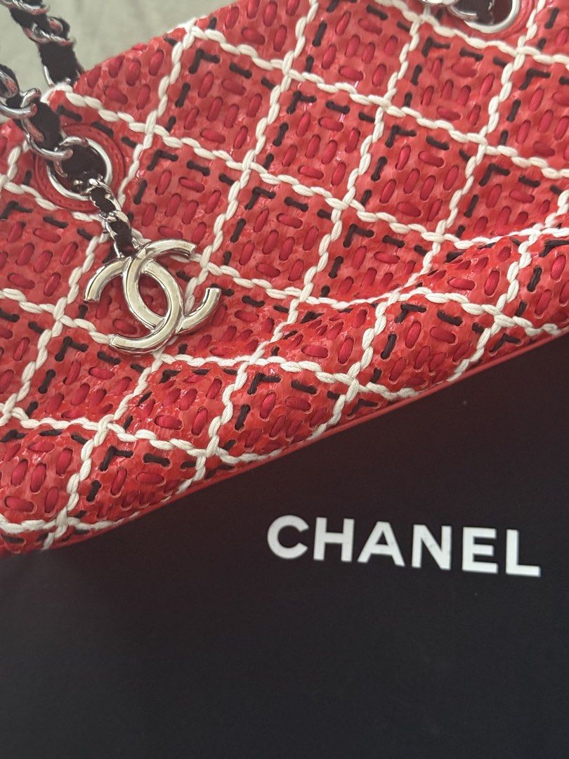 Authentic Chanel Red Woven Chain Shoulder Bag (Category: Shoulder Bags) located in Manila. Submitted by happywhale-0f64 (Listing ID 1468156420, Image 2). Description: - Brand: Chanel - Style: Shoulder bag - Material: Bright red woven fabric with white stitching in a diamond quilt pattern - Hardware: Silver-tone with woven chain straps and hanging CC charm - Closure: Secure zippered top - Inclusions: Dust bag and authenticity card included - Condi