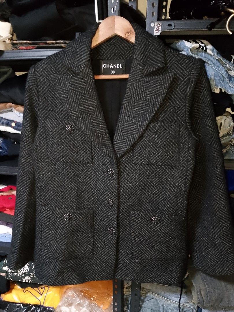 Authentic Chanel Tweed Wool Blazer Jacket Size 36 (Category: Coats, Jackets and Outerwear) located in Manila. Submitted by mjthrifted_second (Listing ID 1468092290, Image 1). Description: - Authentic Chanel blazer in dark grey and black herringbone tweed - Size 36 (160/84 A), made in France - 100% wool exterior with luxurious silk lining - Features a structured collar, front button closure, and four patch pockets with stunning jewel-embellished b