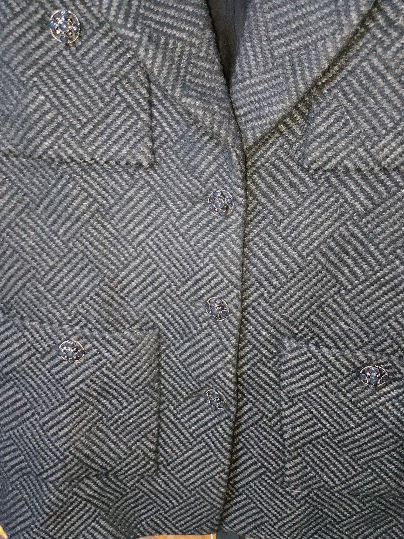 Authentic Chanel Tweed Wool Blazer Jacket Size 36 (Category: Coats, Jackets and Outerwear) located in Manila. Submitted by mjthrifted_second (Listing ID 1468092290, Image 2). Description: - Authentic Chanel blazer in dark grey and black herringbone tweed - Size 36 (160/84 A), made in France - 100% wool exterior with luxurious silk lining - Features a structured collar, front button closure, and four patch pockets with stunning jewel-embellished b