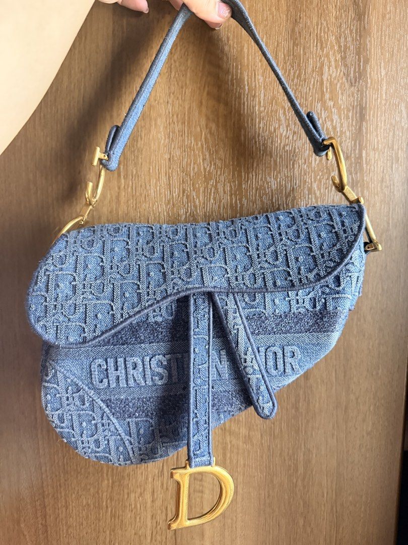 Authentic Dior Blue Oblique Denim Saddle Bag (Category: Luxury Bags & Wallets) located in Antipolo. Submitted by SummerPeaCloset (Listing ID 1468204194, Image 1). Description: The Dior Saddle made a huge comeback in 2018 and it has gone on to remain in style. Just for you to catch on with the Saddle trend comes this gorgeous version in Oblique denim. A single handle and a fabric interior sum the creation up. The bag gives off a modern vibe, but t