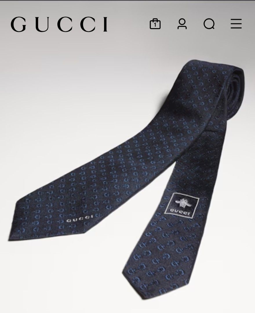 AUTHENTIC GUCCI Navy Blue Horsebit Pattern 100% Silk Jacquard Tie (w/ Box) (Category: Ties) located in Taguig. Submitted by booktothesky (Listing ID 1468204527, Image 1). Description: 🤎 RFS: Won in a raffle 🤍 DM for more details or authenticity check Details from official Gucci site: • Pre-Fall 2024 Collection • Blue and dark blue Horsebit silk jacquard • Gucci bee label on the back • W 7cm x L 148cm • Made in Italy • 100% silk (main fabric); 6