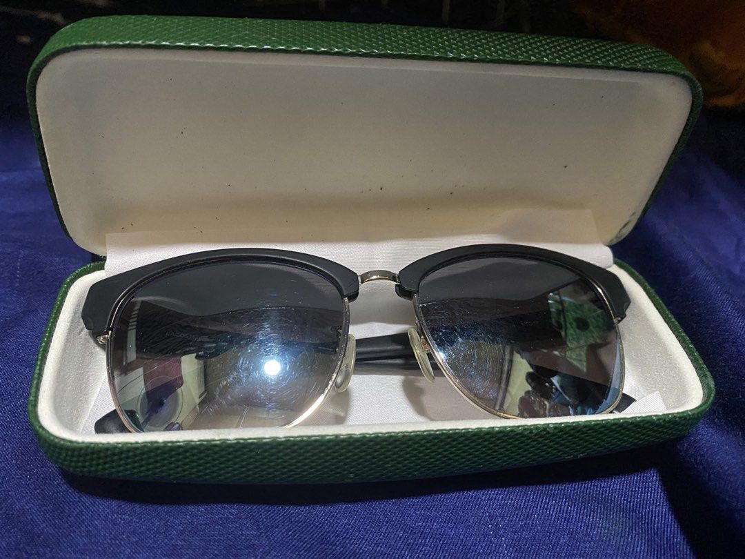 Authentic Lacoste Sunglasses (Category: Sunglasses & Eyewear) located in Bulacan. Submitted by httpsthrift (Listing ID 1468230726, Image 2). Description: Includes Lacoste Case and Lacoste Wipes rfs decluttering .