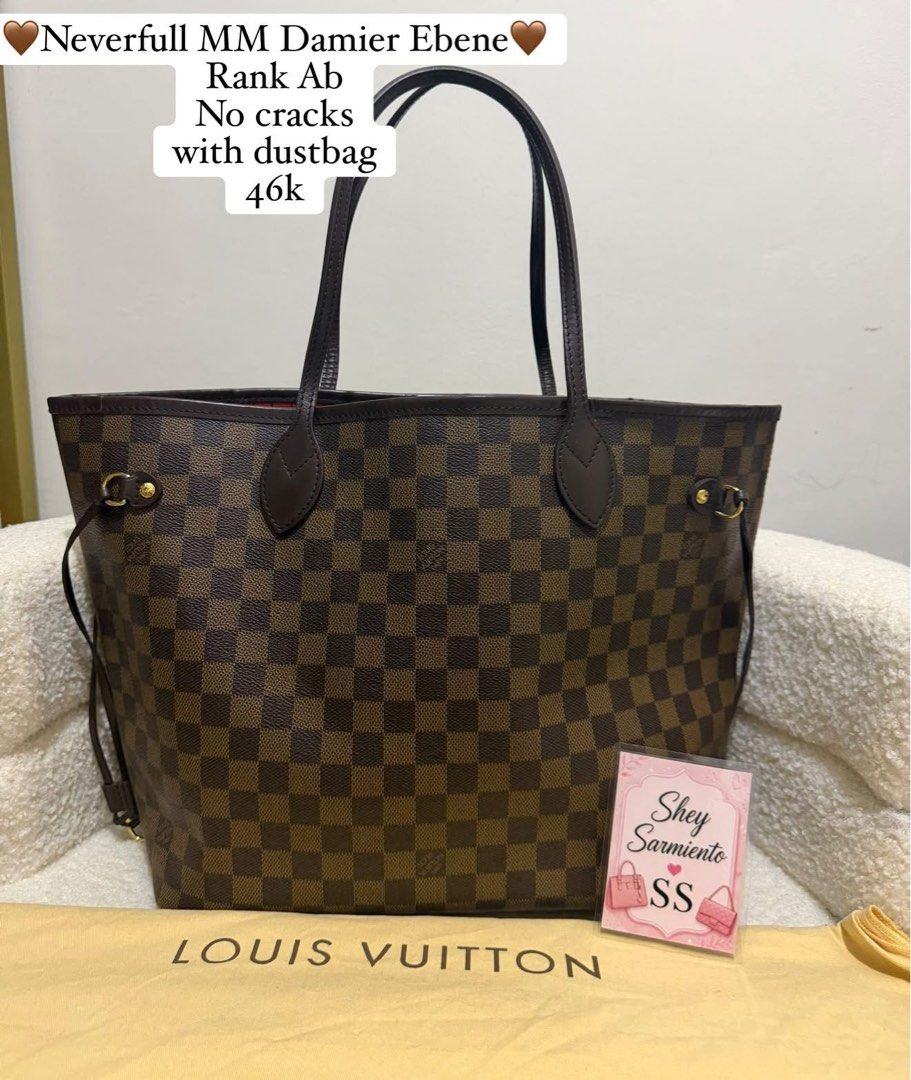 Authentic Louis Vuitton Neverfull MM Damier Ebene (Category: Luxury Bags & Wallets) located in Pasig City. Submitted by sheyfabph (Listing ID 1468082587, Image 1). Description: Authentic Louis Vuitton Neverfull MM in classic Damier Ebene canvas Rank ab Excellent structure: No cracks on the leather or canvas with dustbag 46k.