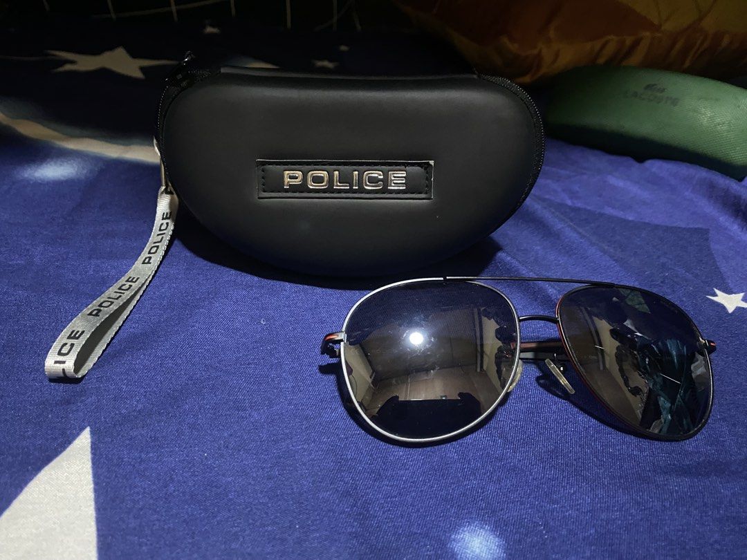 Authentic Police Aviator Sunglass (Category: Sunglasses & Eyewear) located in Bulacan. Submitted by httpsthrift (Listing ID 1468232185, Image 3). Description: Includes Police Case and Police Wipes rfs decluttering.