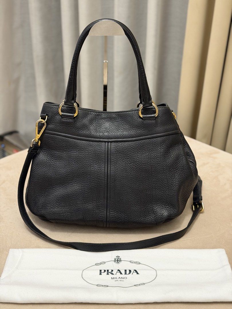 Authentic Prada Vitello Daino Small Two-way Bag (Category: Shoulder Bags) located in Manila. Submitted by maria_2326 (Listing ID 1468068816, Image 2). Description: 💯% Authentic W/dust bag and long strap No lowballing Location: Manila/QC.