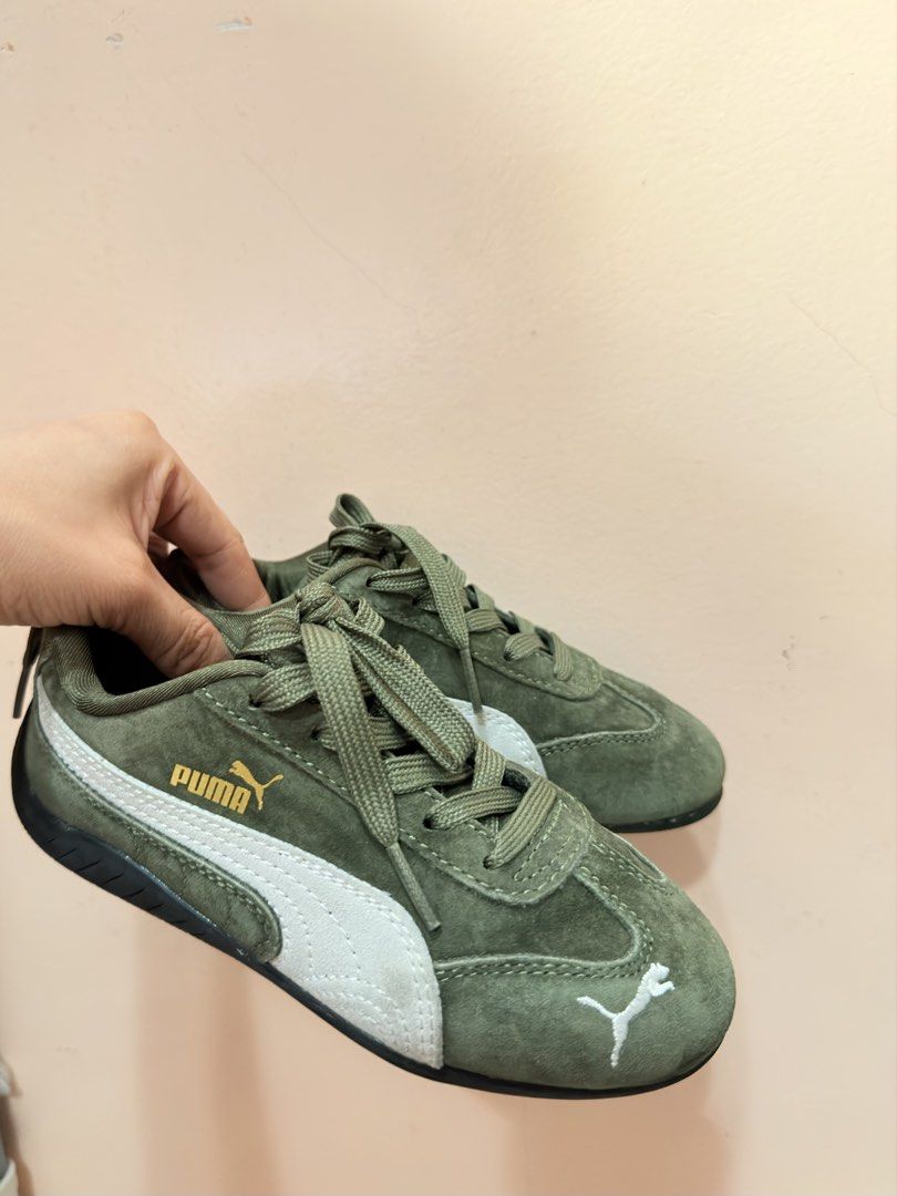 Authentic Puma Speedcat Green Suede Sneakers (Category: Babies & Kids Fashion) located in Butuan. Submitted by itsmel2624 (Listing ID 1468090941, Image 3). Description: - Brand: Puma - Color: Olive green with white side stripe - Material: Premium suede with matching laces - Details: Gold logo lettering and white embroidered cat logo on the toe tip Size 12C.