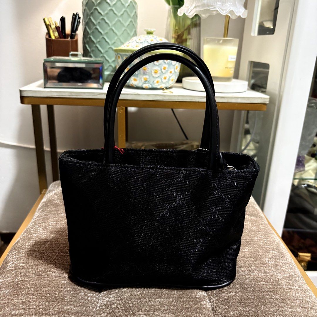 Authentic Roberta de Camerino Black Monogram Top handle Black Bag (Category: Purses & Pouches) located in Binangonan. Submitted by makoleksyon (Listing ID 1468231396, Image 3). Description: Brand new Complete with tags Pwede pang gift Ang cute ng size pero marami nalalagay Size: H-6 -x W-9.5 x D-3 inches Bought in Japan 💯% Authentic Money back guarantee .
