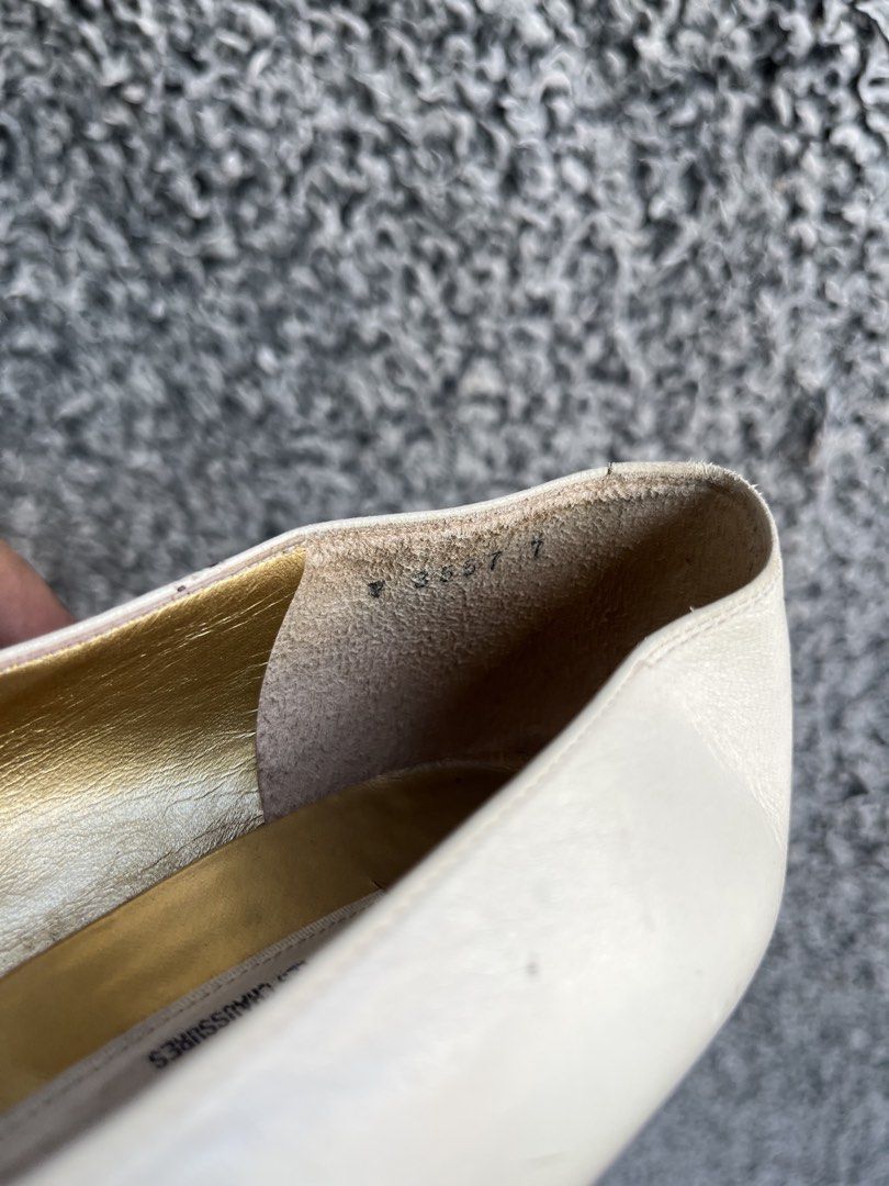 Authentic Valentino Garavani pumps | Size 7 womens (Category: Heels) located in General Trias. Submitted by zrchustle.604 (Listing ID 1468140176, Image 3). Description: authentic vintage pair of Valentino Garavani pumps from their historic archival footwear lines. Key Details & Identification Features: • The Brand Label: The cloth label sewn into the footbed reads "Valentino Garavani" alongside the brand's classic "V" logo enclosed in a circle. B