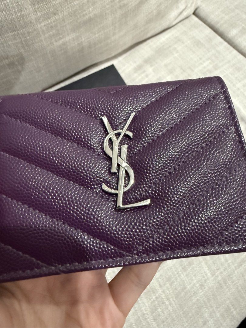 Authentic YSL Cassandre wallet (Category: Wallets & Card holders) located in Manila. Submitted by echipmunk (Listing ID 1468169277, Image 3). Description: 100% authentic almost new YSL wallet in purple Used for half a day then stored COMPLETE - with box, tags, care card and dust bag RFS not used to small wallets SLIGHTLY NEGOTIABLE!!! Will block low ballers 🙏🏻.