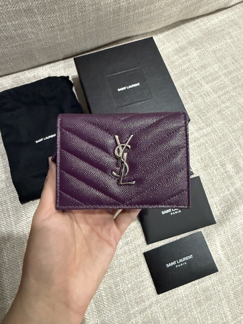 Authentic YSL Cassandre wallet (Category: Wallets & Card holders) located in Manila. Submitted by echipmunk (Listing ID 1468169277, Image 2). Description: 100% authentic almost new YSL wallet in purple Used for half a day then stored COMPLETE - with box, tags, care card and dust bag RFS not used to small wallets SLIGHTLY NEGOTIABLE!!! Will block low ballers 🙏🏻.