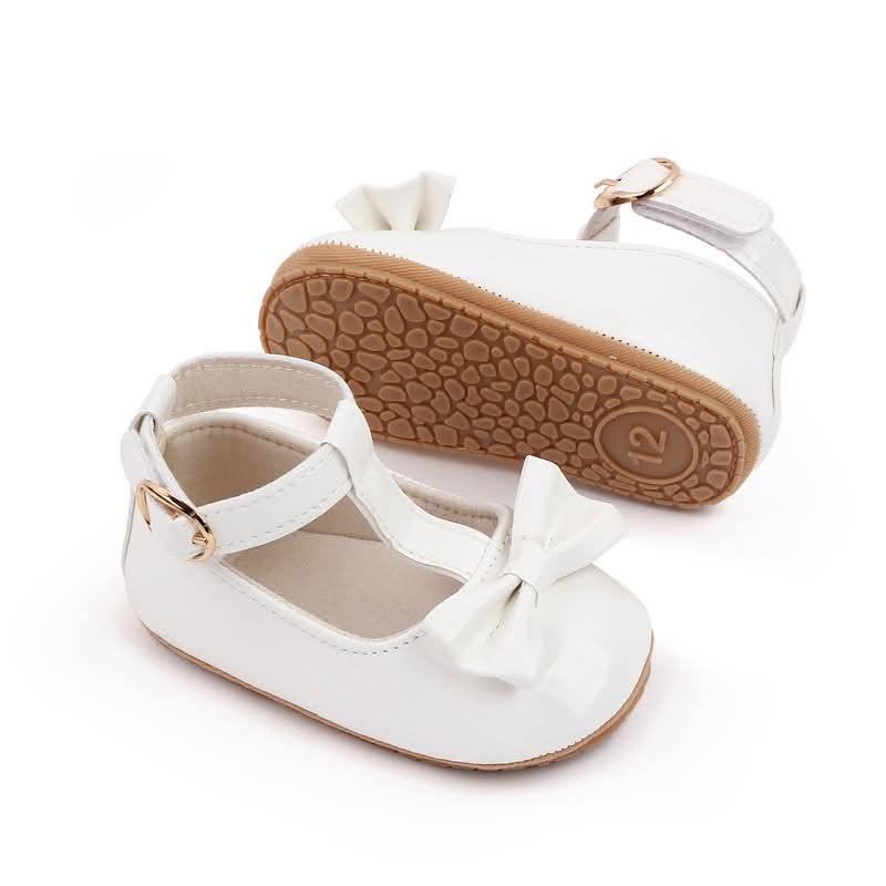 Baby Infant Soft Sole Walking Shoes Multiple Styles (Category: Babies & Kids Fashion) located in Manila. Submitted by eldagaga1786666 (Listing ID 1468078799, Image 1). Description: - Adorable and comfy soft-soled baby shoes for infants - Available in multiple cute designs: white T-bar shoes with bows, pink/blue number-print sneakers, grey velcro trainers, and black lace-up sneakers - Flexible rubber soles with grip patterns for safe first steps -