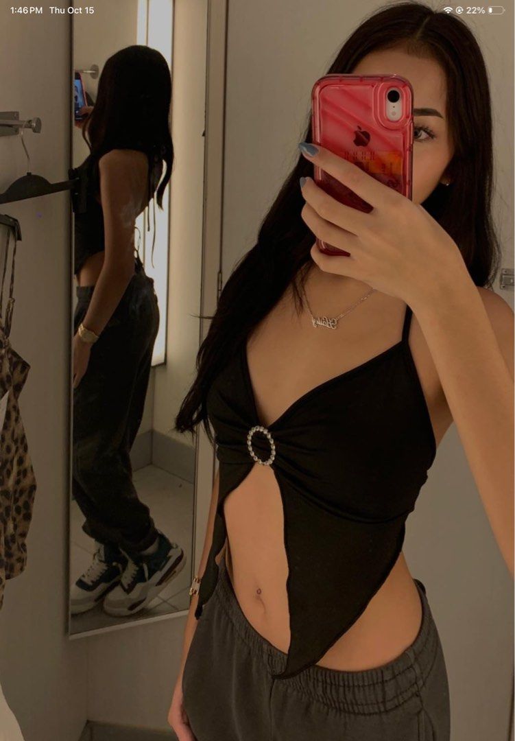 Backless Black String Crop Top with Rhinestone Ring Detail (Category: Sleeveless) located in Manila. Submitted by ley_luvss (Listing ID 1468103664, Image 1). Description: - Color: Black - Style: Halter neck crop top with a backless, open-back design - Details: Eye-catching rhinestone ring in the center, edgy asymmetrical pointed hem - Straps: Thin ties that adjust around the neck - Occasion: Perfect for parties, clubs, and nights out - Condition:
