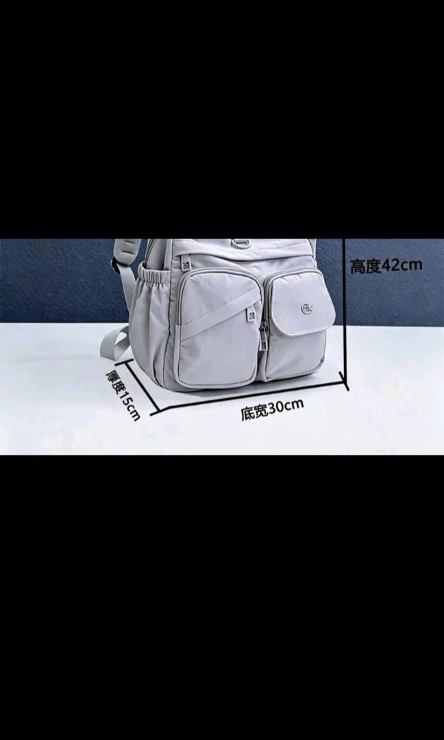 Backpack (Category: Backpacks) located in Singapore. Submitted by bonnybunny (Listing ID 1468194651, Image 3). Description: Bought at live but I missed the return period so selling to clear my closet. Water repellent and lightweight. Suitable for travel or school. Can fit laptop n have many compartments. Brand new with tag..