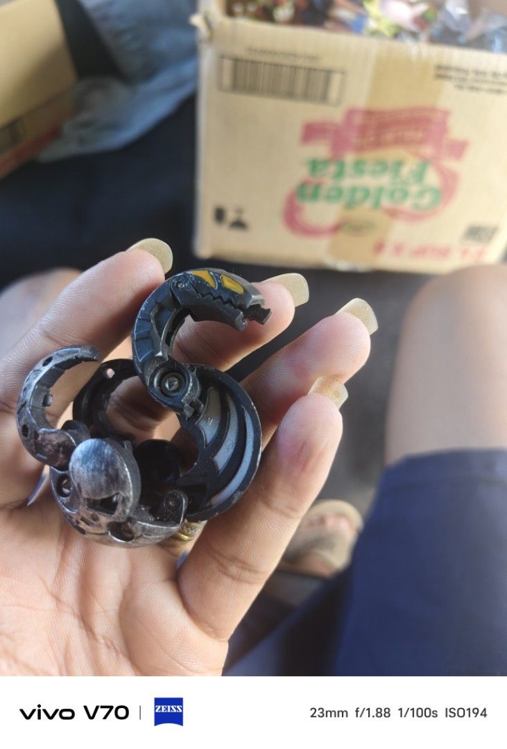 Bakugan Haos Hydranoid Darkus Bakugan Toy (Category: Action & Battle Toys) located in Kapangan. Submitted by ClumZyDale (Listing ID 1468082867, Image 1). Description: - Item: Black and Silver Bakugan Collectible Toy - Power Level: 790G printed on the side - Design: Dragon-snake head with striking yellow eyes and center attribute symbol - Condition: Loose, sold as-is without original packaging - Perfect for: Classic battle game fans and toy collec