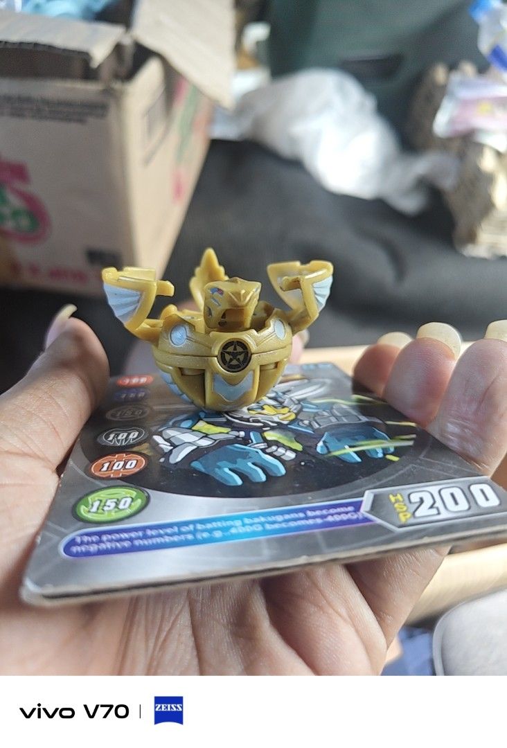 Bakugan toy figures with cards (Category: Action & Battle Toys) located in Kapangan. Submitted by ClumZyDale (Listing ID 1468093105, Image 2). Description: - Set of Bakugan toy figures in blue, gold, grey, and green - Made from a durable mix of metal and plastic materials - Perfect for serious collectors and fans of the series - Ready for action-packed battles or shelf display prices varies from each bakugan.