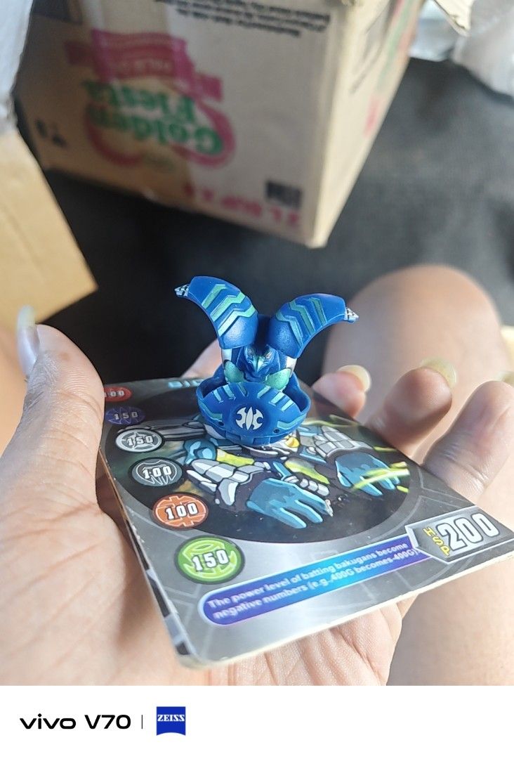 Bakugan toy figures with cards (Category: Action & Battle Toys) located in Kapangan. Submitted by ClumZyDale (Listing ID 1468093105, Image 1). Description: - Set of Bakugan toy figures in blue, gold, grey, and green - Made from a durable mix of metal and plastic materials - Perfect for serious collectors and fans of the series - Ready for action-packed battles or shelf display prices varies from each bakugan.