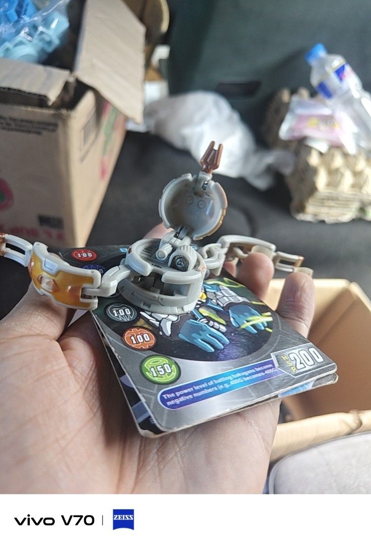 Bakugan toy figures with cards (Category: Action & Battle Toys) located in Kapangan. Submitted by ClumZyDale (Listing ID 1468093105, Image 3). Description: - Set of Bakugan toy figures in blue, gold, grey, and green - Made from a durable mix of metal and plastic materials - Perfect for serious collectors and fans of the series - Ready for action-packed battles or shelf display prices varies from each bakugan.