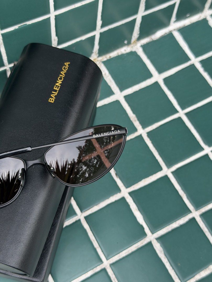BALENCIAGA (Category: Luxury Accessories) located in Angeles City. Submitted by secondluxph (Listing ID 1468208169, Image 3). Description: -BALENCIAGA RAZOR CAT SUNGLASSES -BB0315S -BLACK METAL FRAME AND DEEP GRAY TINTED HUES LENSES -COMPLETE INCLUSIONS BOX, CASE, MICROFIBER CLOTH -PRISTINE CONDITION -JAPAN/HONGKONG SOURCE .