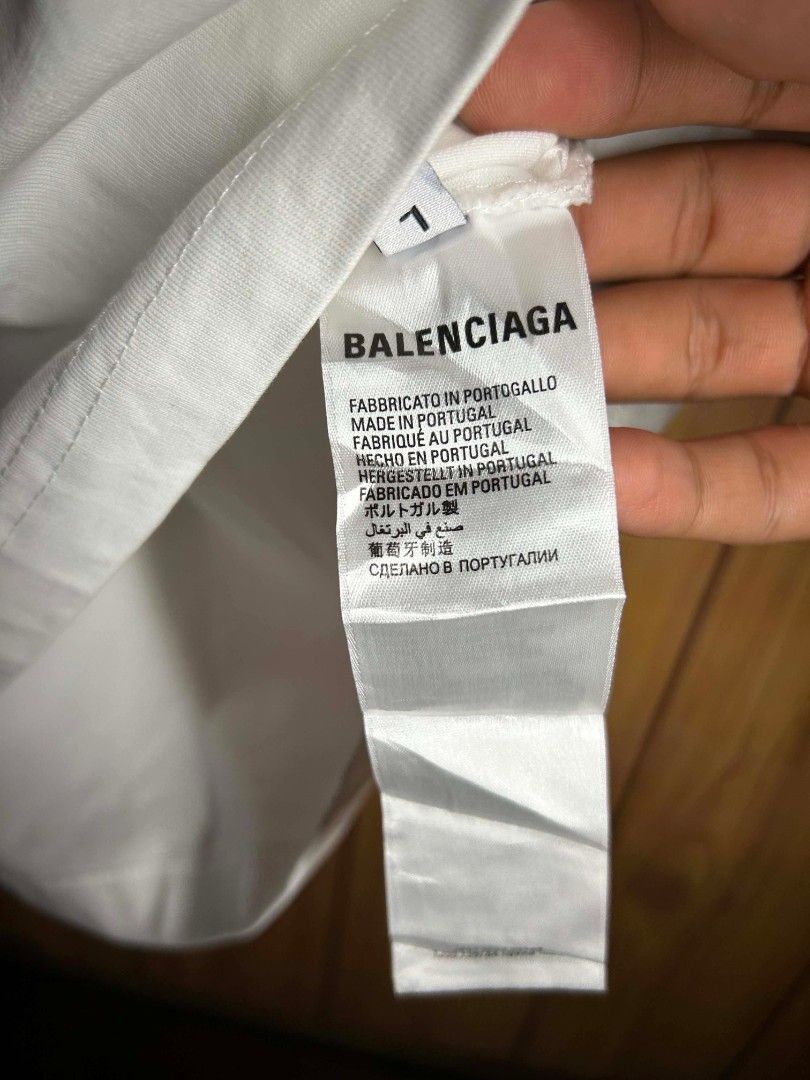 Balenciaga BB Interlock Graphic T-shirt (Category: Tshirts & Polo Shirts ) located in Manila. Submitted by zerowastethriftco. (Listing ID 1468235173, Image 3). Description: -As New Condition -White na White pa crispy condition -L30xW23 -No Issue -Heavy Cloth.