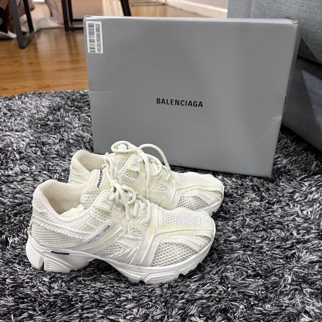 Balenciaga Phantom Sneakers White Size 38 (Category: Sneakers) located in Manila. Submitted by natalyali (Listing ID 1468176360, Image 1). Description: - Brand: Balenciaga Phantom - Color: Clean White - Size: EU 38 - Condition: Worn 1-2 times, very minimal wear on treads - Inclusions: Original grey Balenciaga shoe box - Style: Chunky design with signature branding, perfect for streetwear fits.