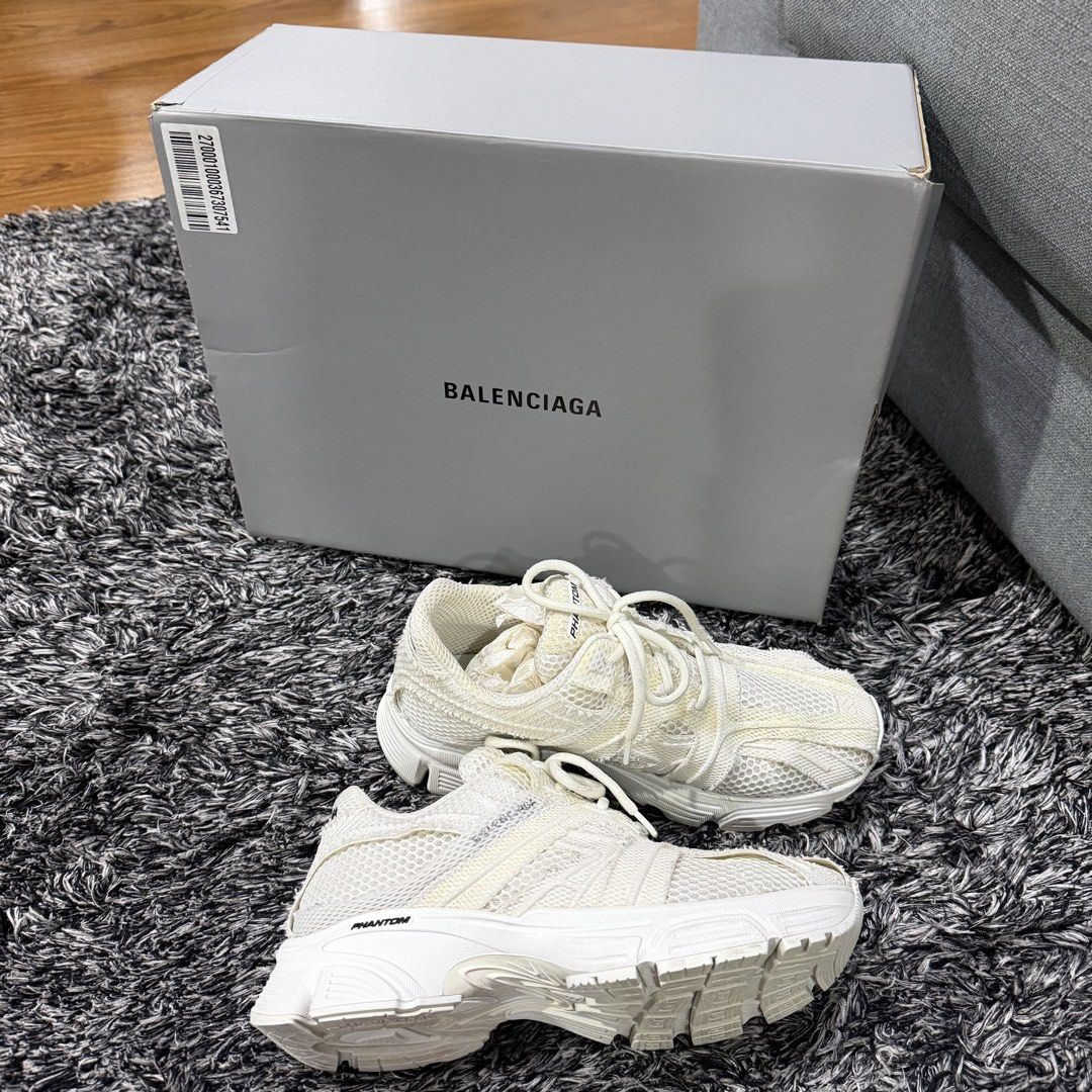Balenciaga Phantom Sneakers White Size 38 (Category: Sneakers) located in Manila. Submitted by natalyali (Listing ID 1468176360, Image 3). Description: - Brand: Balenciaga Phantom - Color: Clean White - Size: EU 38 - Condition: Worn 1-2 times, very minimal wear on treads - Inclusions: Original grey Balenciaga shoe box - Style: Chunky design with signature branding, perfect for streetwear fits.