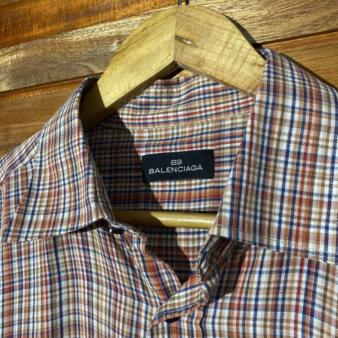 Balenciaga Plaid Button-Up Shirt (Category: Luxury Apparel) located in Andop. Submitted by rhouzze.ph24 (Listing ID 1468166071, Image 2). Description: OPEN FOR NEGOTIATION Name: Balenciaga Dimensions: 23.5 by 31 Size: Medium Issue: None.