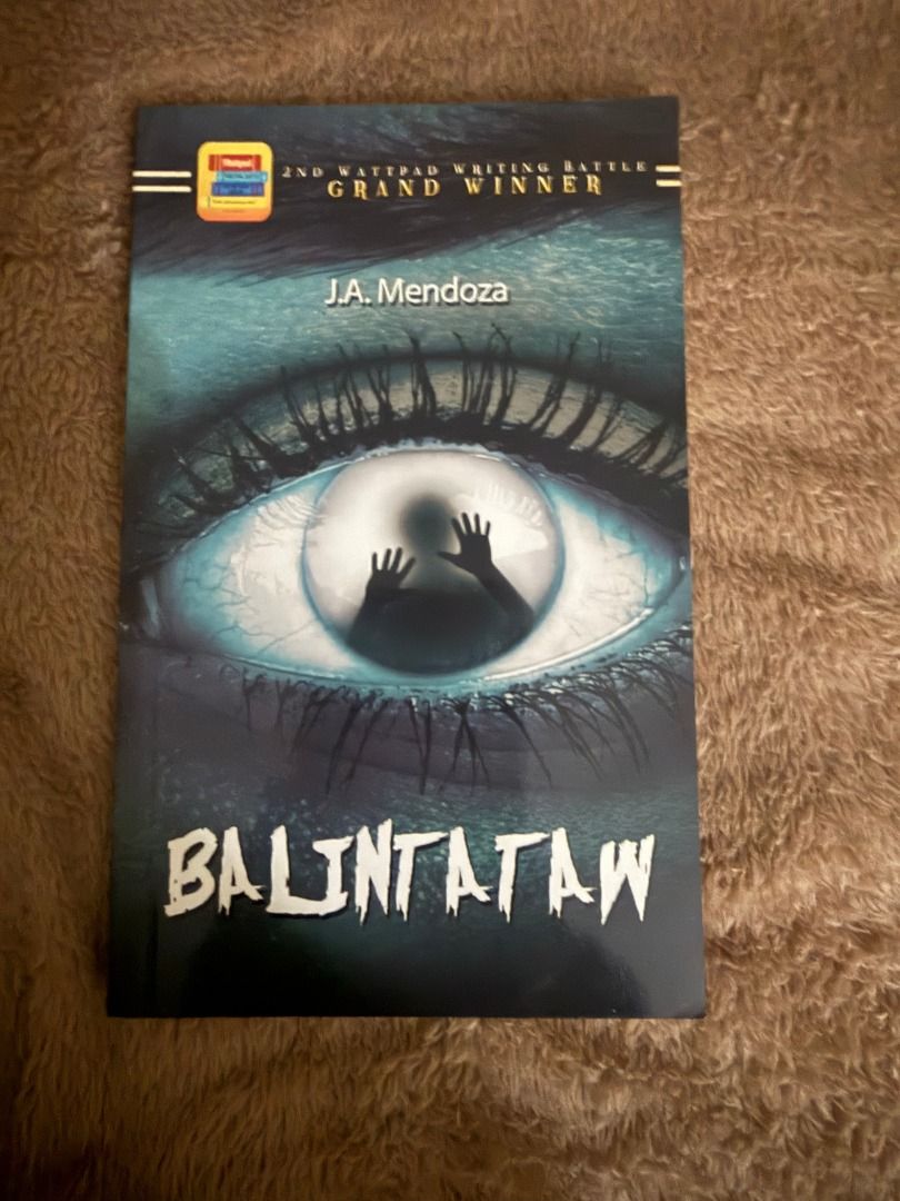 Balintataw by J.A. Mendoza (Category: Storybooks) located in Manila. Submitted by vaultfinds (Listing ID 1468267895, Image 1). Description: Balintataw book by J.A. Mendoza. 2nd Wattpad Writing Battle Grand Winner. Paperback fiction novel. Good read for thriller fans. Clean cover, sharp corners..
