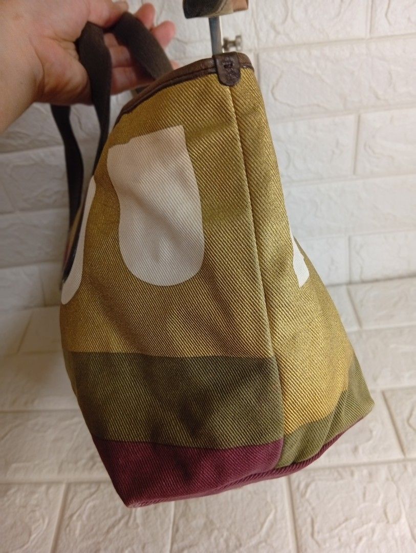 Bally Multicolor Canvas Tote Bag (Category: Tote Bags) located in Las Pinas. Submitted by etoksi1234 (Listing ID 1468065169, Image 3). Description: Pre-loved Bally Multicolor Canvas Tote Bag featuring a geometric color-block pattern (often called the Boothbay or geometric B-logo design) with brown canvas double top handles and leather trim. Made in Switzerland..