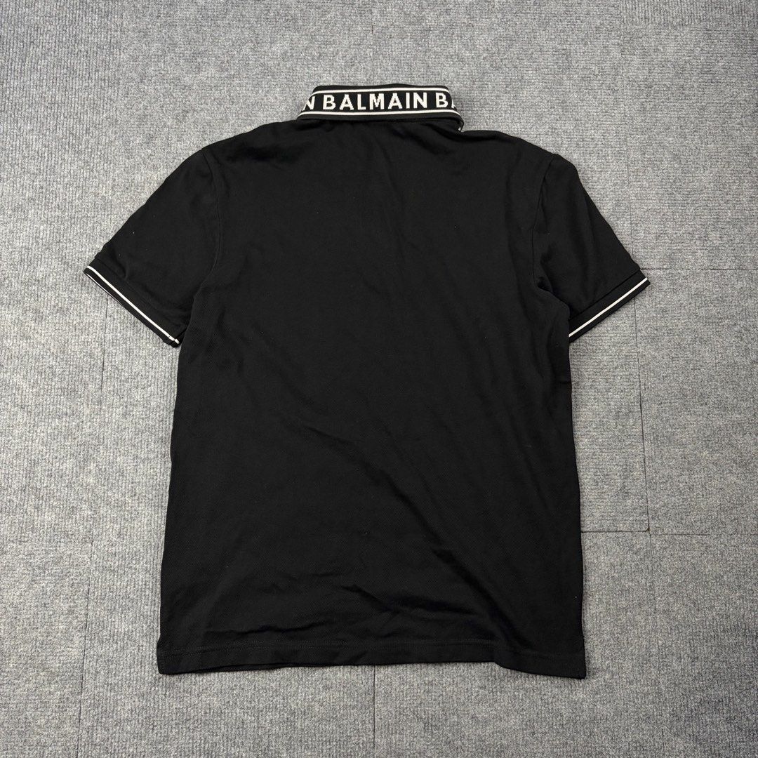 Balmain Black Polo Shirt (Category: Luxury Apparel) located in Manila. Submitted by yourtherapist_ (Listing ID 1468249220, Image 2). Description: Balmain Black Polo Shirt Size: XS Condition: Excellent Material: 100% Cotton Measurements Width: 19 Length: 25 Shoulder: 16 3,000.