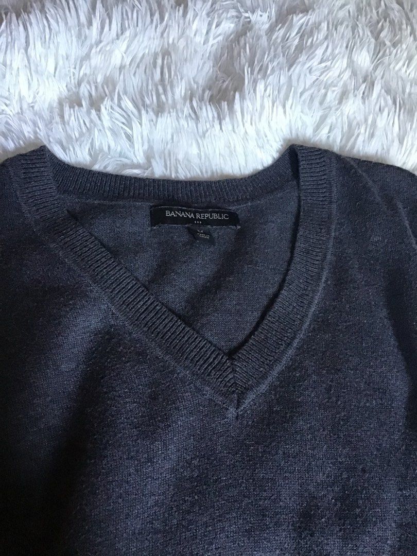 Banana Republic Dark vest (Category: Coats, Jackets and Outerwear) located in Cebu City. Submitted by venomouswhisk (Listing ID 1468087649, Image 2). Description: - Brand: Banana Republic - Color: Dark Grey - Size: Medium - Style: Classic V-neck with ribbed collar trim - Material: Soft knit fabric - Condition: Great layering piece for cooler weather, highly versatile neutral tone 🎀 MOD: J&t 🎀MOP: Gcash.