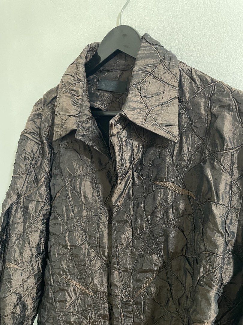 Baovicto Brown Crinkled Texture Button-Down Shirt (Category: Coats, Jackets and Outerwear) located in Makati City. Submitted by pabilipoako_ (Listing ID 1468060472, Image 2). Description: - Brand: Baovicto - Color: Dark brown - Design: Unique crinkled, crumpled texture with abstract contrast stitching lines - Details: Collared neck, long sleeves with button cuffs, hidden front button placket - Extras: Includes extra replacement button on the wash