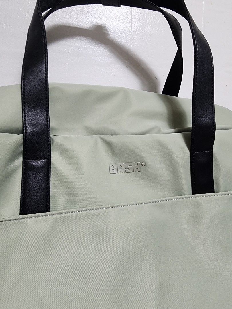 BASH Gateway Large Weekender in Sage (Category: Luxury Bags & Wallets) located in Manila. Submitted by jemmiealeinn (Listing ID 1468158108, Image 2). Description: Like New BASH Gateway Large Weekender Bag in Sage Condition: - Like new - only used once - no pouch but with dustbag RFS: Decluttering / not being used Details: - sold out in Bash online and offline stores - Spacious 36.6L capacity - Waterproof nvlon material , Padded laptop compartment