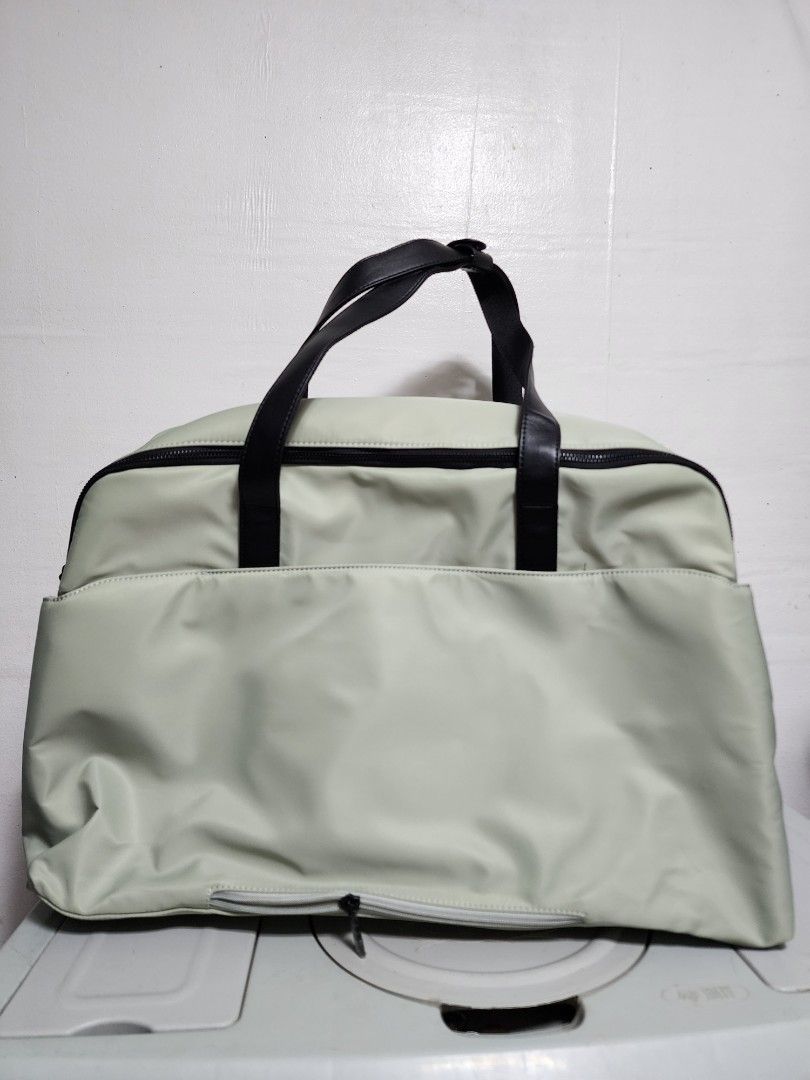 BASH Gateway Large Weekender in Sage (Category: Luxury Bags & Wallets) located in Manila. Submitted by jemmiealeinn (Listing ID 1468158108, Image 3). Description: Like New BASH Gateway Large Weekender Bag in Sage Condition: - Like new - only used once - no pouch but with dustbag RFS: Decluttering / not being used Details: - sold out in Bash online and offline stores - Spacious 36.6L capacity - Waterproof nvlon material , Padded laptop compartment