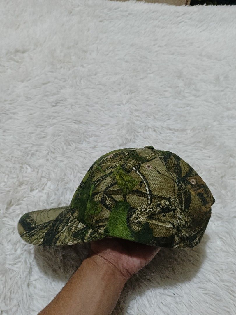 Bass Pro Shops Camouflage Hat (Category: Caps & Hats) located in Quezon City. Submitted by jdwoah12 (Listing ID 1468070051, Image 3). Description: - Authentic Bass Pro Shops cap - Realistic woodland camouflage print - Embroidered logo patch on the front - Structured crown with breathable stitched eyelets - Curved brim with matching camo pattern - Clean and well-maintained condition - Ideal for hunting, fishing, and everyday casual wear.