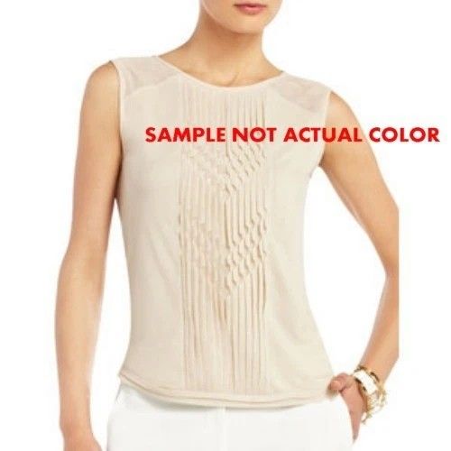 BCBGMAXAZRIA Tulle Top (Category: Sleeveless) located in General Trias. Submitted by relove_closet8 (Listing ID 1468145702, Image 2). Description: • Washed and never used. • Lightweight and soft. • Intricate basket woven mesh front panel highlighted by the chevron pintuck pleating. • Sheer tulle panels at the shoulders 😍. • Buyer handles shipping fee and book J&T or Lalamove only. • Payment first via bank transfer or e-wallet • No cancellation/r