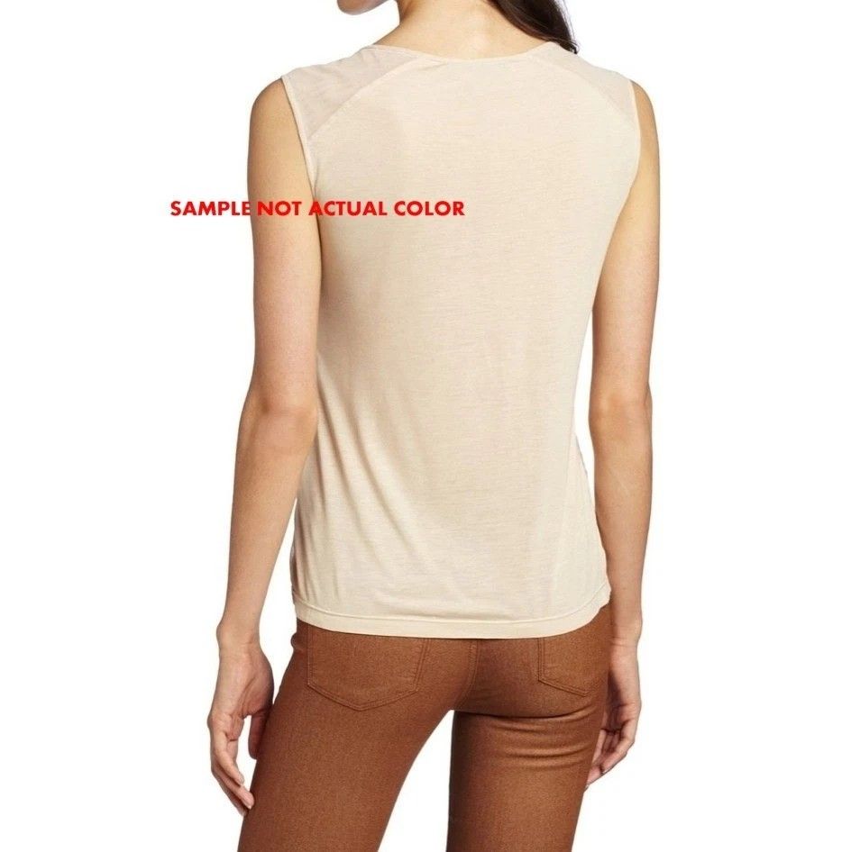BCBGMAXAZRIA Tulle Top (Category: Sleeveless) located in General Trias. Submitted by relove_closet8 (Listing ID 1468145702, Image 3). Description: • Washed and never used. • Lightweight and soft. • Intricate basket woven mesh front panel highlighted by the chevron pintuck pleating. • Sheer tulle panels at the shoulders 😍. • Buyer handles shipping fee and book J&T or Lalamove only. • Payment first via bank transfer or e-wallet • No cancellation/r