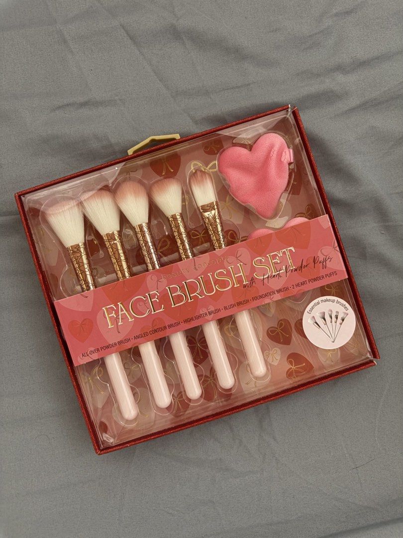 Beauty Concepts Face Brush Set with Puffs (Category: Makeup) located in Manila. Submitted by izzmya (Listing ID 1468065686, Image 1). Description: Beauty Concepts face brush set, unopened in red sparkly box. Includes all-over powder brush, angled contour brush, highlighter brush, blush brush, foundation brush, and two pink heart powder puffs. Handles are pale pink with gold ferrule details. Great complete makeup tool kit for daily routines or gif
