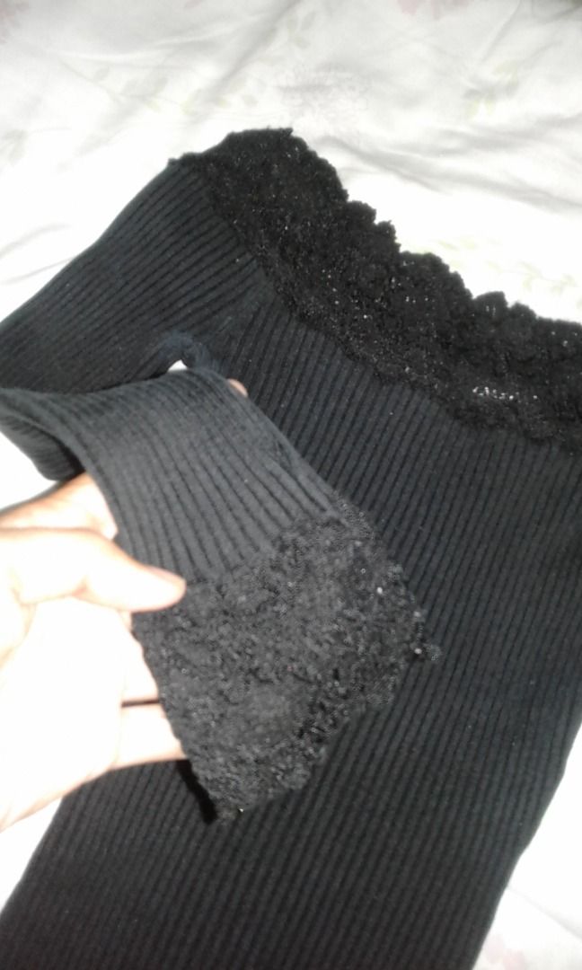 Bebe Black Ribbed Knit Sweater Size XS (Category: Longsleeves) located in La Trinidad. Submitted by roseee.a84fe6 (Listing ID 1468212271, Image 2). Description: - Brand: Bebe - Size: XS - Color: Black - Material: Warm textured ribbed knit - Features: Classic crew neckline with thick ribbed collar trim - Origin: Made in China - Condition: Clean label inside, great basic piece for layering.
