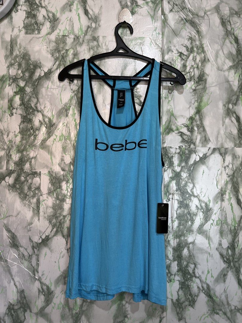 BEBE Y2K tank top (Category: Sleeveless) located in Bulacan. Submitted by letsfindukaywithme (Listing ID 1468059408, Image 2). Description: Bebe Y2k Vintage Tank top Large Cotton strechable Like new No issue +sf payment first Ship via J&T.