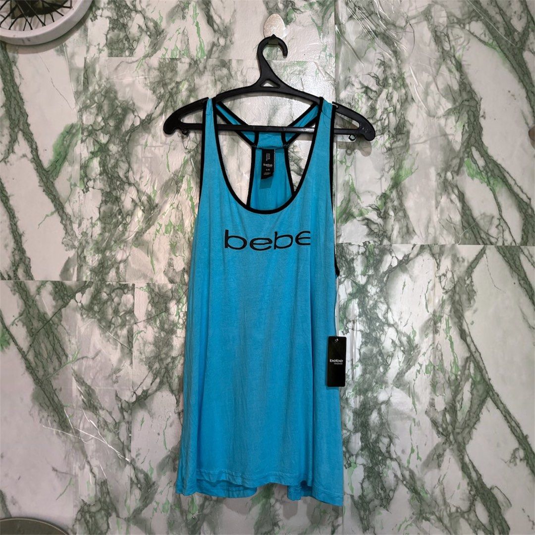 BEBE Y2K tank top (Category: Sleeveless) located in Bulacan. Submitted by letsfindukaywithme (Listing ID 1468059408, Image 1). Description: Bebe Y2k Vintage Tank top Large Cotton strechable Like new No issue +sf payment first Ship via J&T.