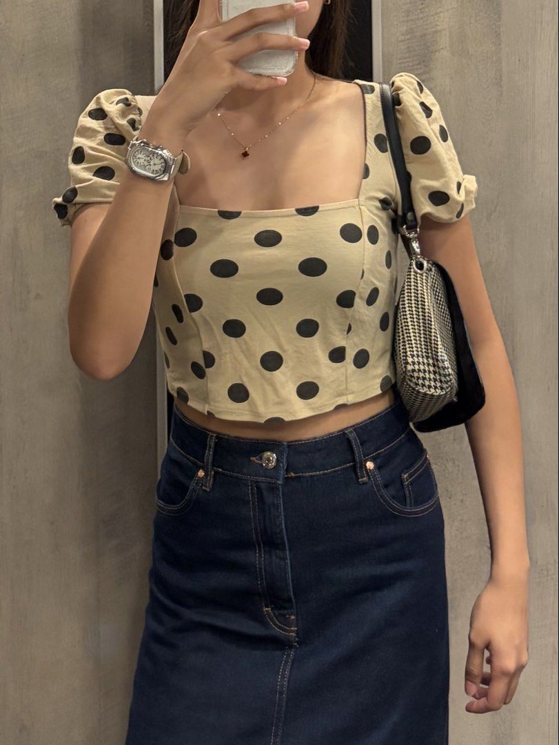 Beige Polka Dot Crop Top with Puff Sleeves (Category: Blouses) located in Manila. Submitted by cpaa.aaa (Listing ID 1468136338, Image 2). Description: Beige with black polka dots Size: XS-M Square neckline puff sleeves Adjustable tie-back detail Stretchy smocked back panel for comfort, cropped length .