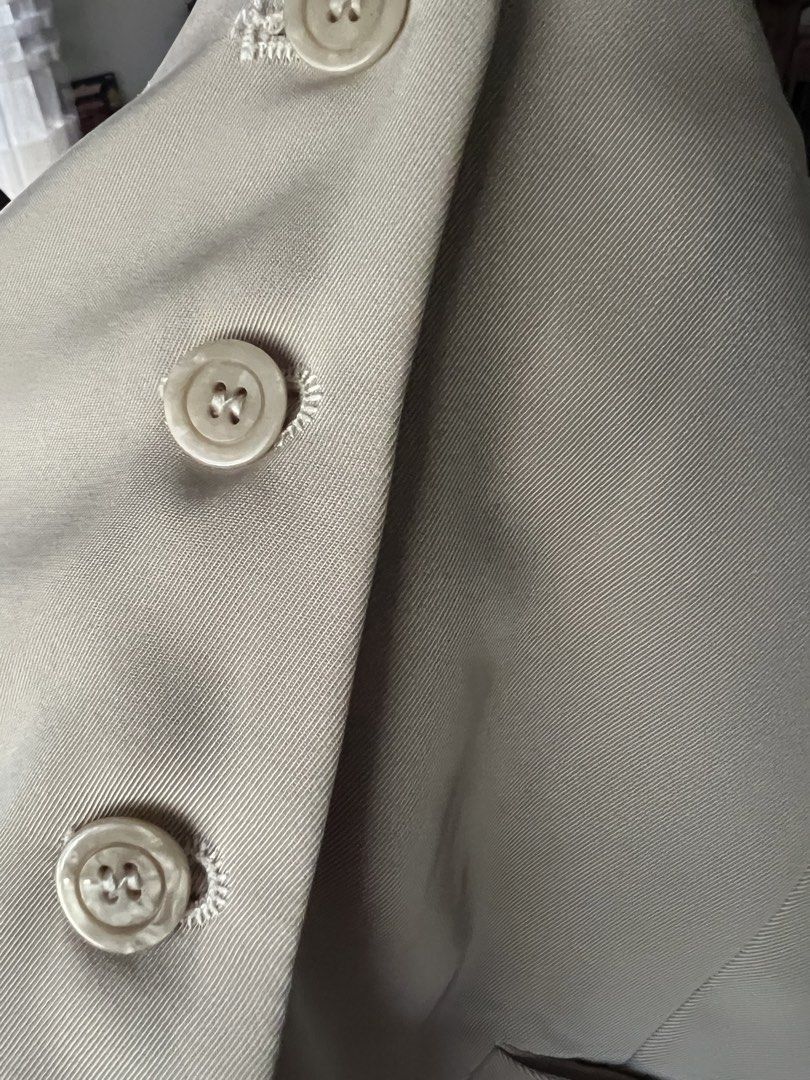 Beige tailored vest (Category: Sleeveless) located in Angeles City. Submitted by msr093 (Listing ID 1468113037, Image 3). Description: - Color: Beige - Style: Tailored waistcoat with clean lines - Closure: Four front buttons - Lining: Fully lined with white fabric .