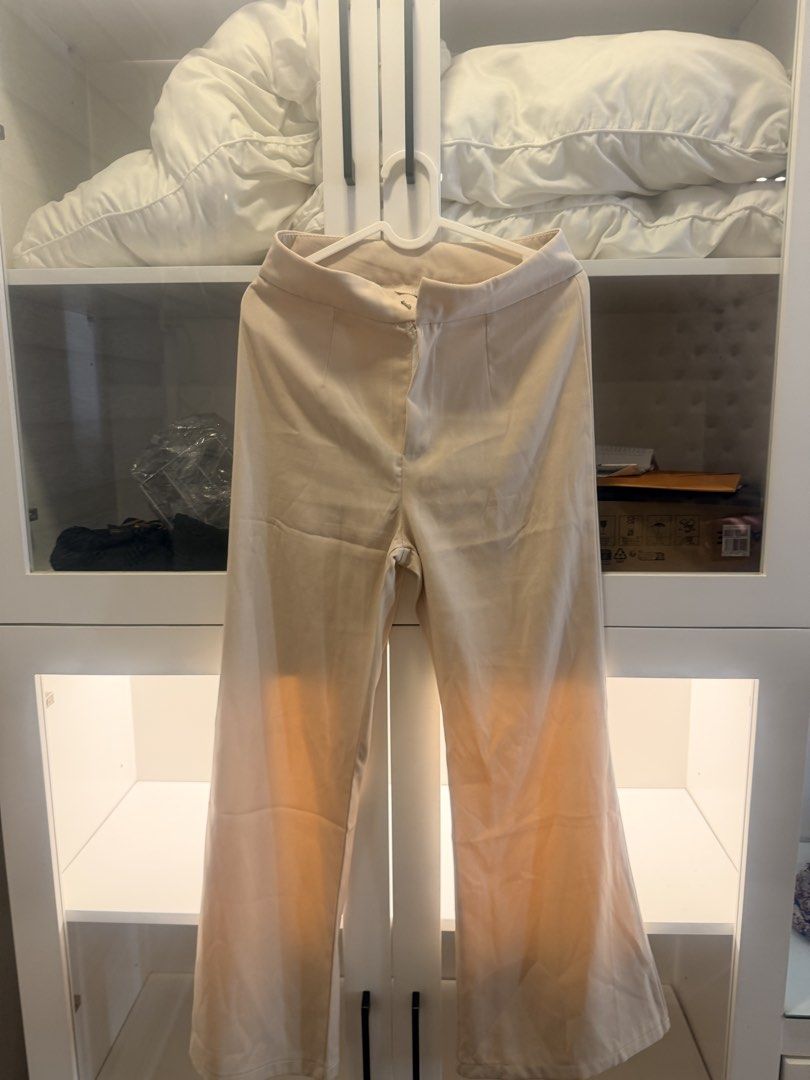 Beige trousers (Category: Other Bottoms) located in Quezon City. Submitted by destashingmycloset (Listing ID 1468115950, Image 1). Description: .