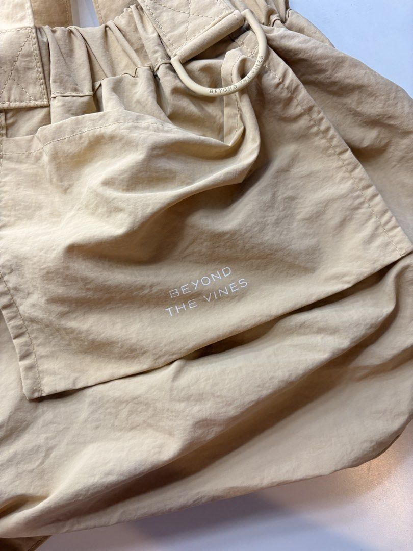 Beyond The Vines XS Dumpling Bag Khaki (Category: Tote Bags) located in Mandaluyong City. Submitted by boopiefinds (Listing ID 1468192741, Image 2). Description: Can do trades .