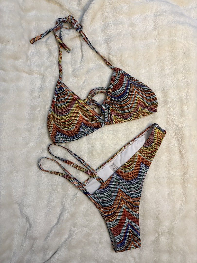 Bikini Set (Category: Bikinis & Swimsuits) located in Pasay City. Submitted by lysqndr (Listing ID 1468165532, Image 2). Description: - Brand new with tags attached - Pink and white swirl pattern - Underwire top with adjustable straps - Matching high-cut bottoms - Lightweight stretch fabric.