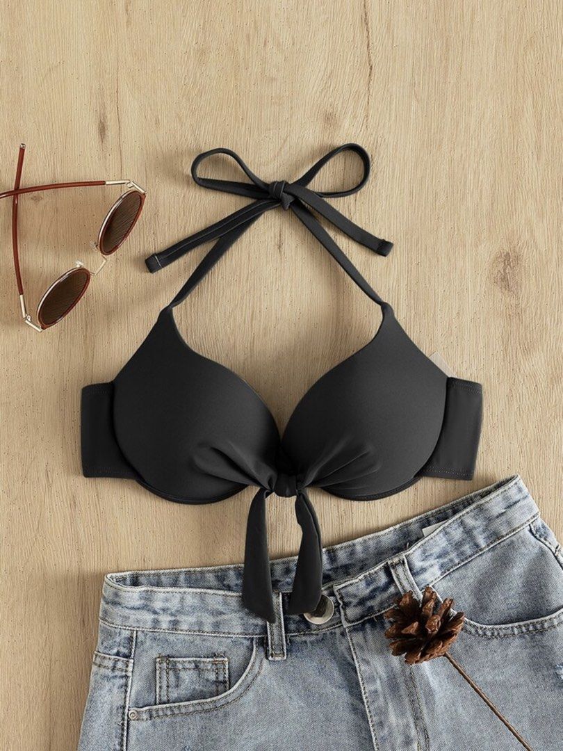Black Bikini Top with Tie Detail (Category: Bikinis & Swimsuits) located in Manila. Submitted by preloveditems_jem (Listing ID 1464306475, Image 1). Description: - Stylish black bikini top - Features a flattering tie detail at the front - Adjustable straps for a customized, comfortable fit - Ideal for beach days, pool parties, or your next vacation - Combines comfort and style for a great look.