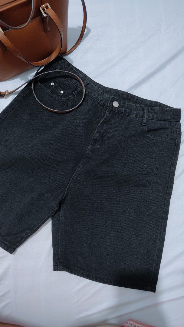 Black Denim Shorts (Category: Shorts) located in Bacolor. Submitted by annjjjjj (Listing ID 1468082661, Image 1). Description: - Color: Black - Closure: Button closure with belt loops - Pockets: Standard five-pocket styling with front rivet details - Fit: Mid-length cut, great for casual wear - Material: Sturdy and durable denim fabric.
