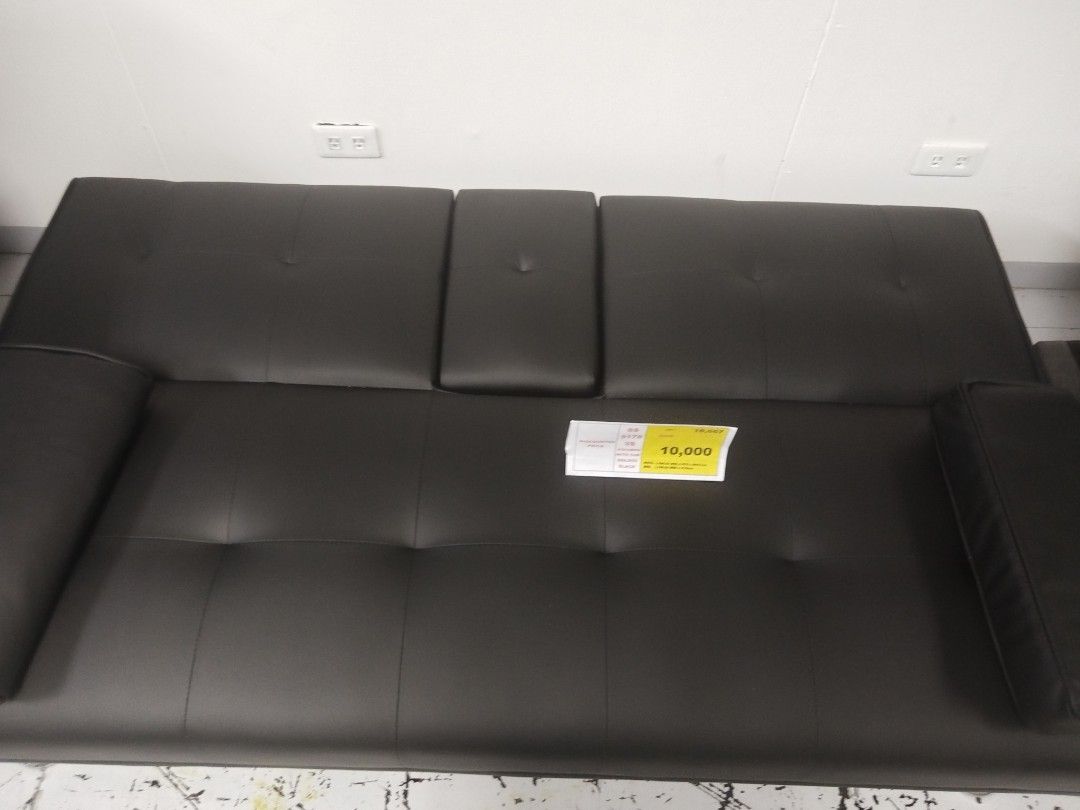 Black Faux Leather Sofa Bed with Chrome Legs (Category: Sofas) located in Manila. Submitted by zealdragon.930c01 (Listing ID 1468112699, Image 2). Description: - Sleek black faux leather sofa bed with a modern design - Easily converts into a comfortable bed for guests - Stylish tufted backrest and sturdy chrome metal legs - Includes 2 matching arm pillows - Solid and durable build, ideal for living rooms or guest rooms - Condition: Clean surface 